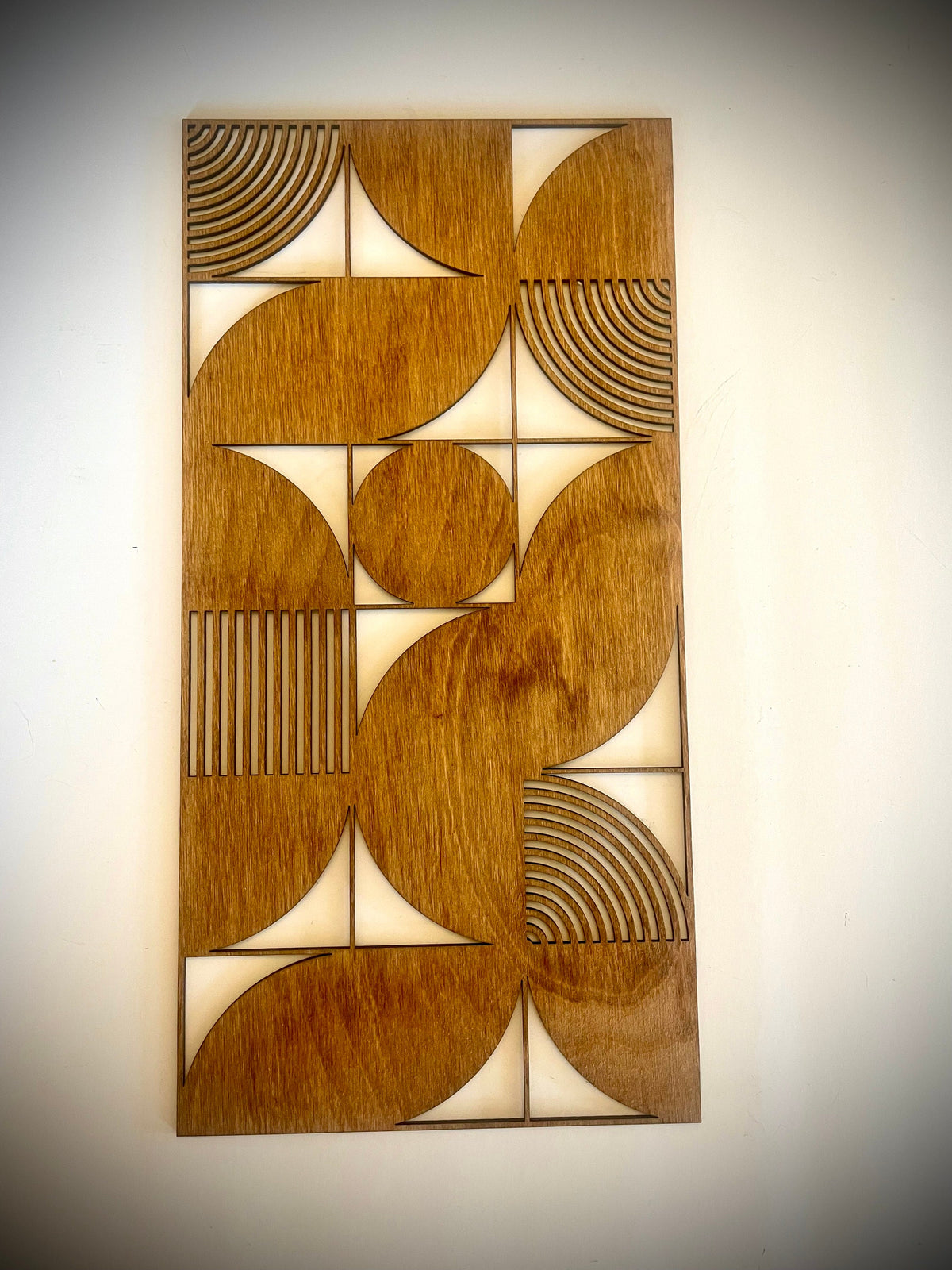 Middle panel of the Boho Modern Bauhaus Style wood wall art Set A, geometric circles and arcs, Golden Oak