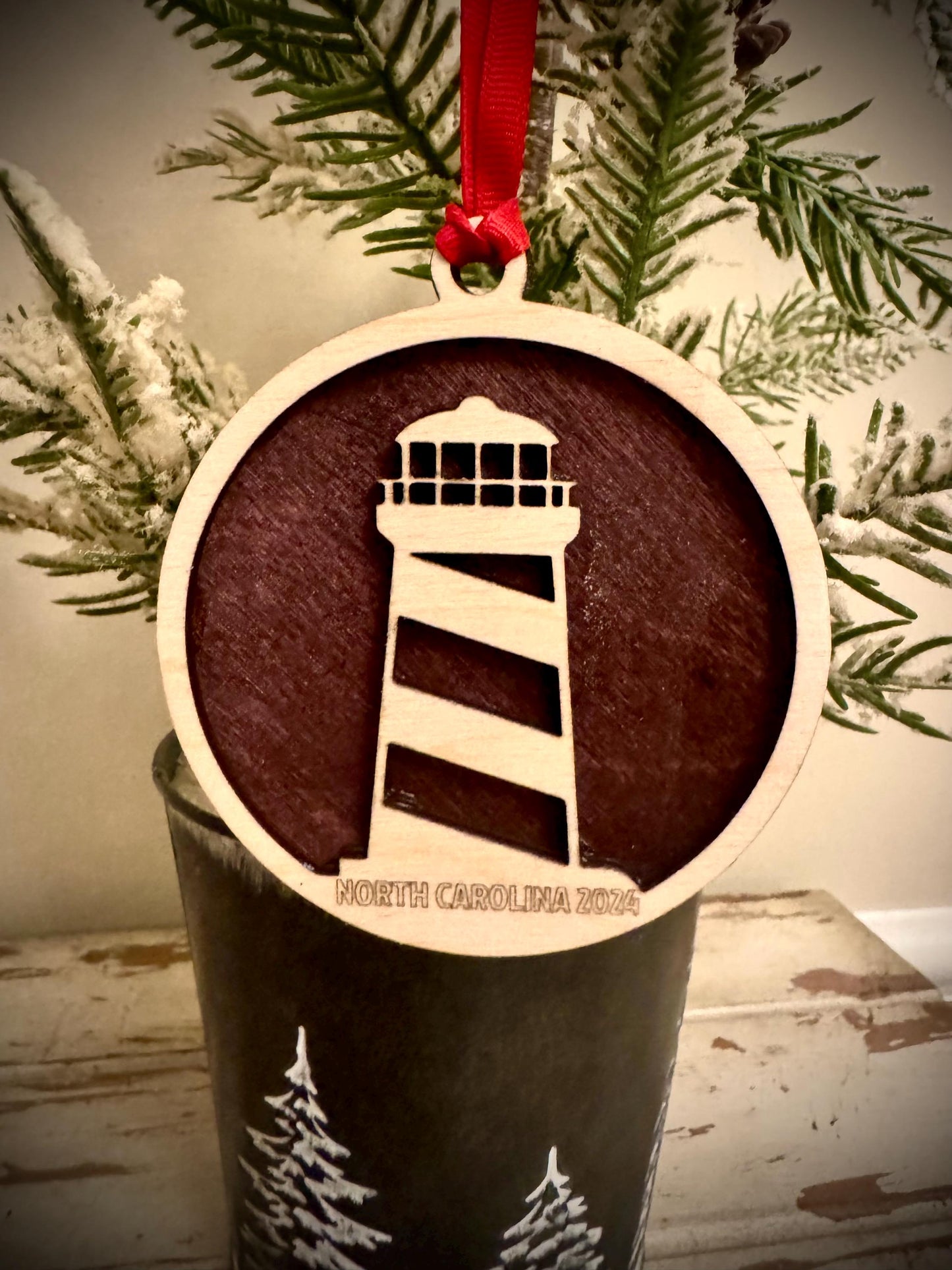 Lighthouse with diagonal stripes 2-layer personalized laser cut wood Christmas ornament, gift tag available in 12 finishes.