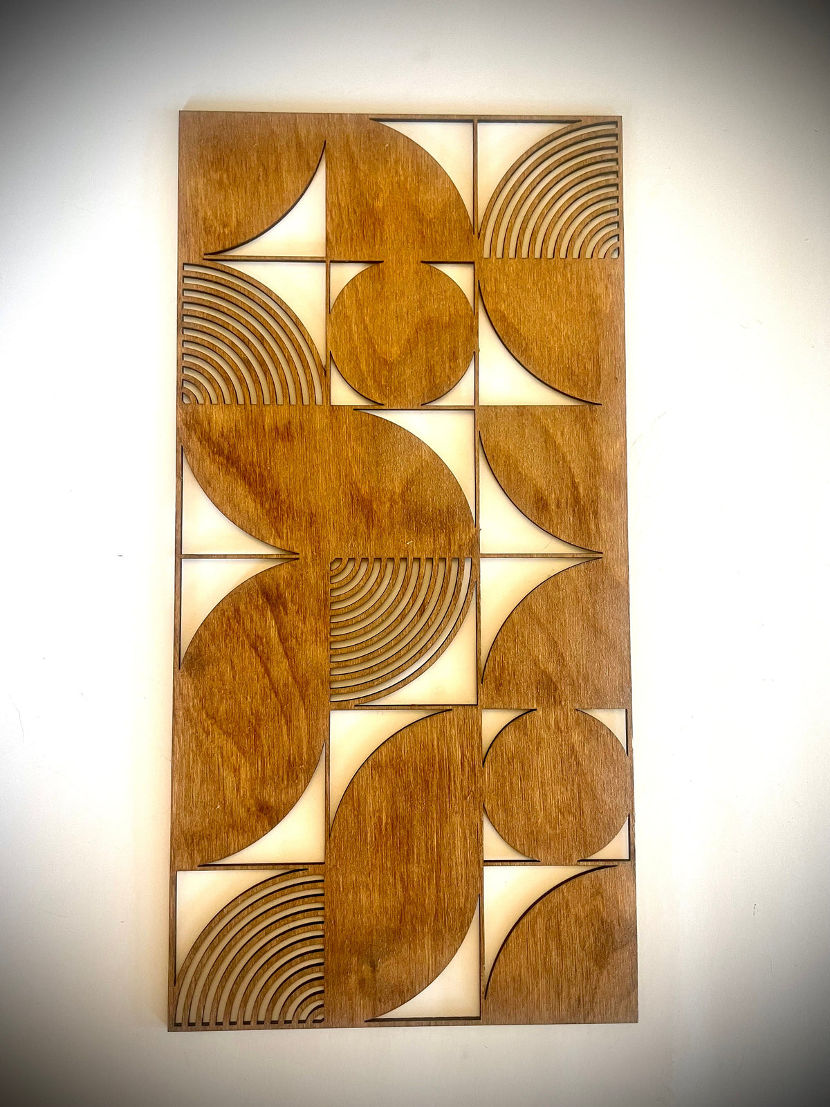 Left panel of the Boho Modern Bauhaus Style wood wall art Set A, geometric circles and arcs, Golden Oak